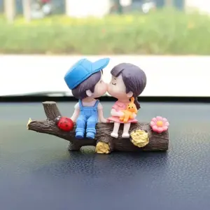 Couple Sitting on Tree Trunk Decorative Figurine