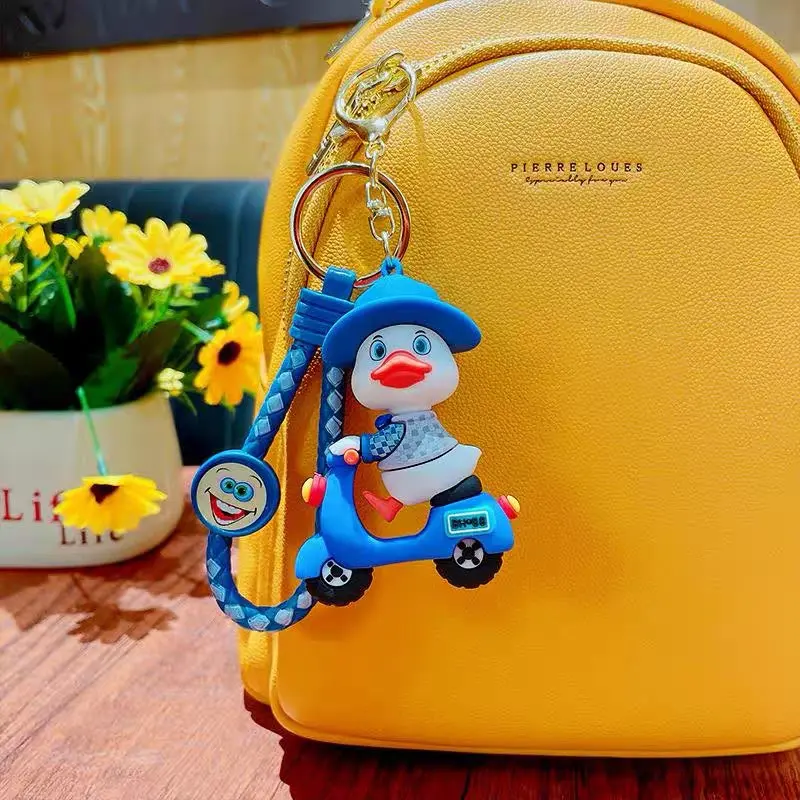 Cute Duck Riding Scooter Keychain
