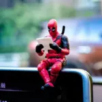 Reading Deadpool Collectible Figure