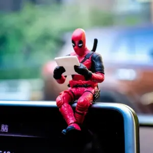 Reading Deadpool Collectible Figure